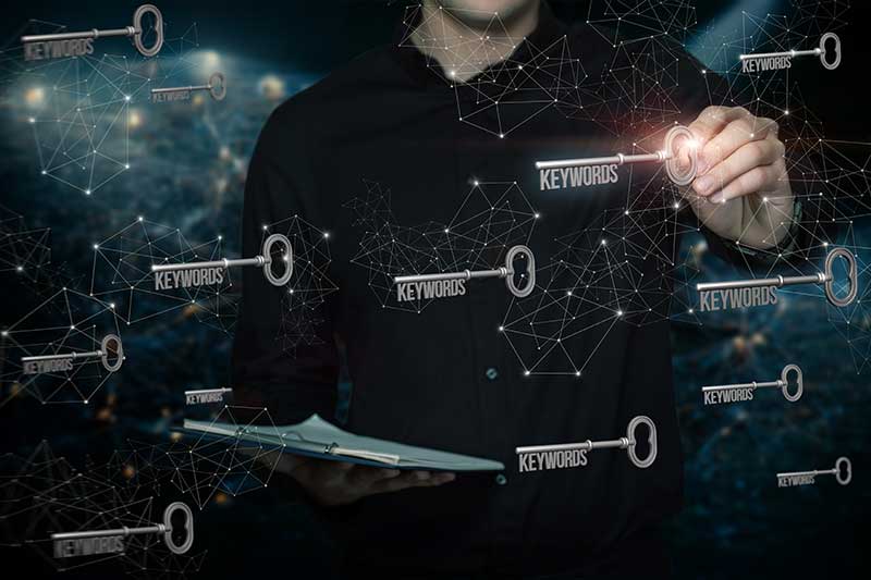 search engine marketing agency boston ma - image of man reaching for floating keys in the air around him